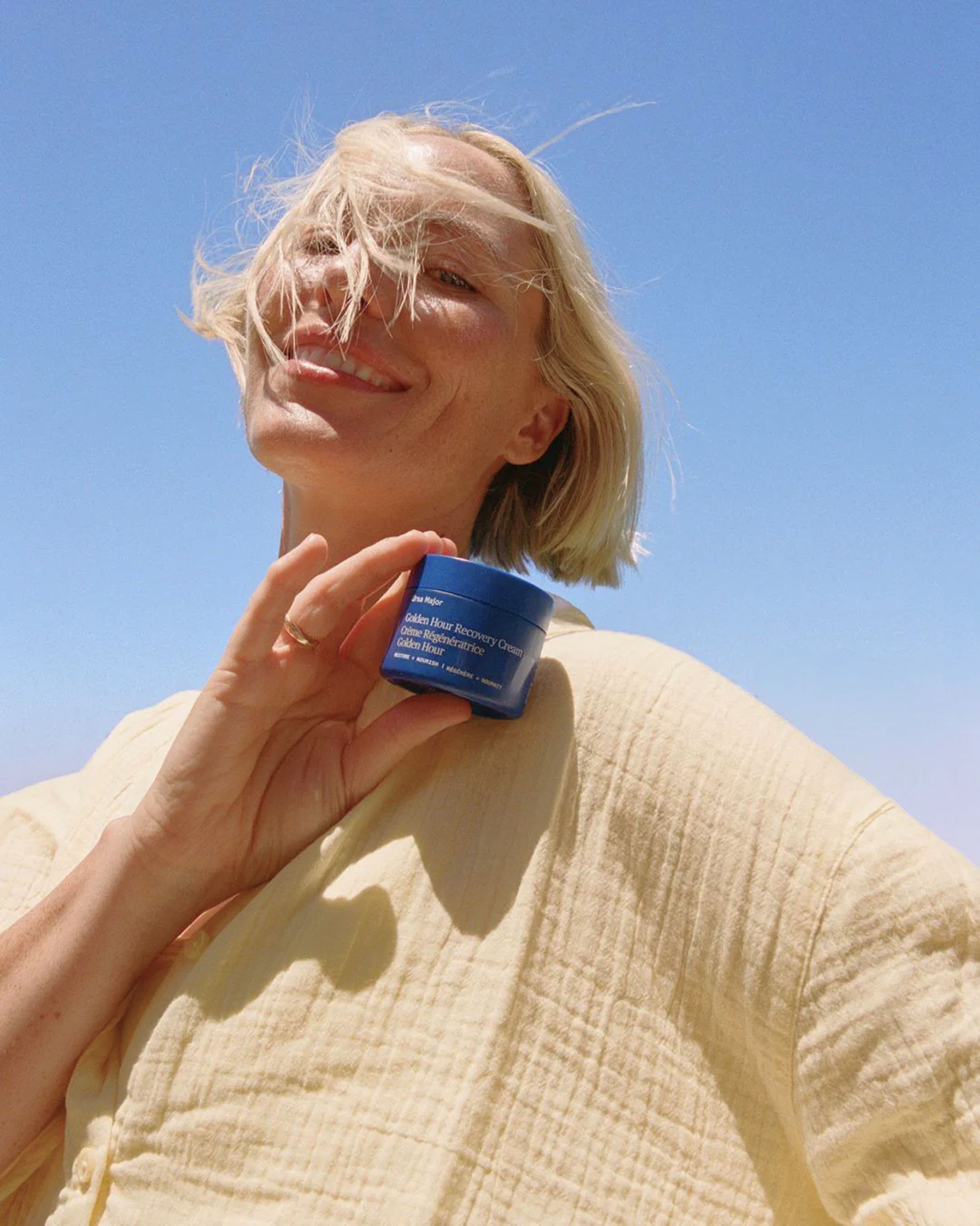 Woman holding a MinoMino jar